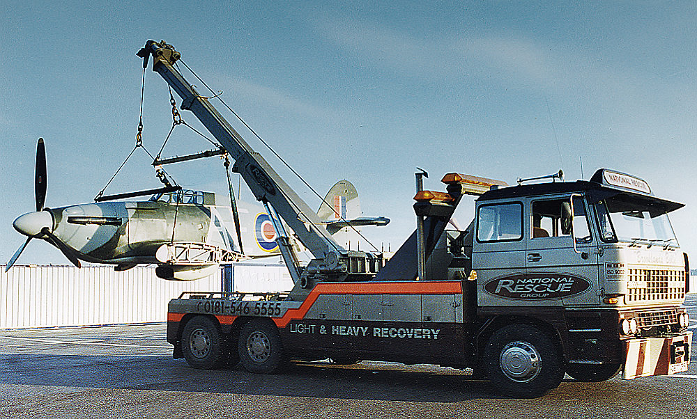 G-HURR Brian Angliss Hawker Hurricane on the back of a National Rescue crane